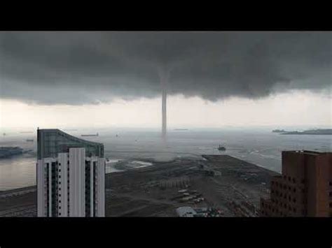 Waterspout #singapore2020 i saw this waterspout. Singapore 11 May 2019: Boat sails into tornado (waterspout ...