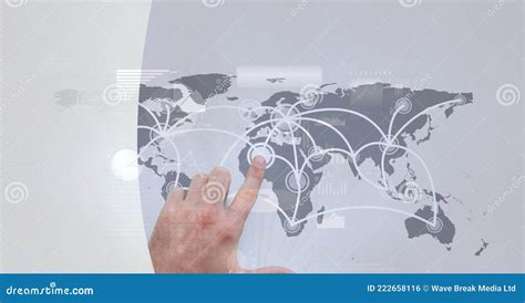 Composition Of Finger Touching Interactive World Map Stock Photo