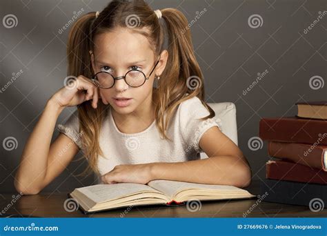 Eight Years Old Girl With Books N Stock Photo Image Of Eyeglasses Caucasian