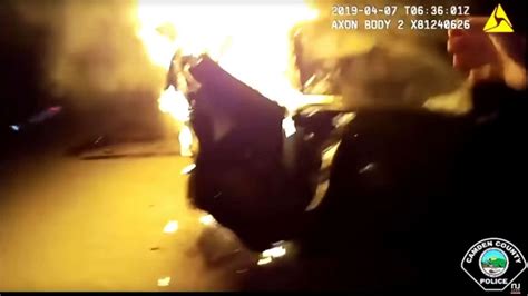 Dramatic Video Shows Officers Pulling Victims Out Of Burning Car Before Its Engulfed In Flames