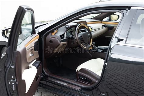 Modern Luxury Car Interior Steering Wheel Shift Lever And Dashboard