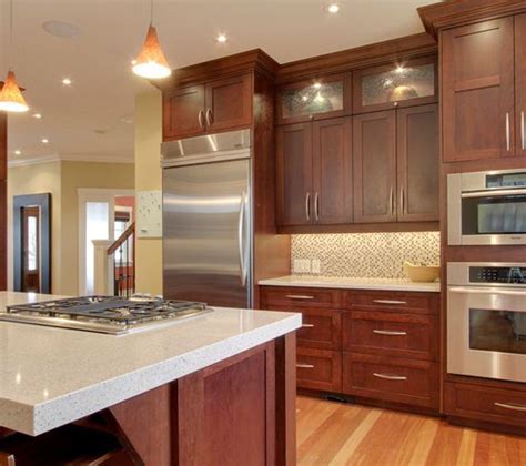 Visitors to your home will know that your kitchen means business with such. Cherry Wood cabinets with stainless and light countertop | Cherry wood kitchen cabinets, Quartz ...