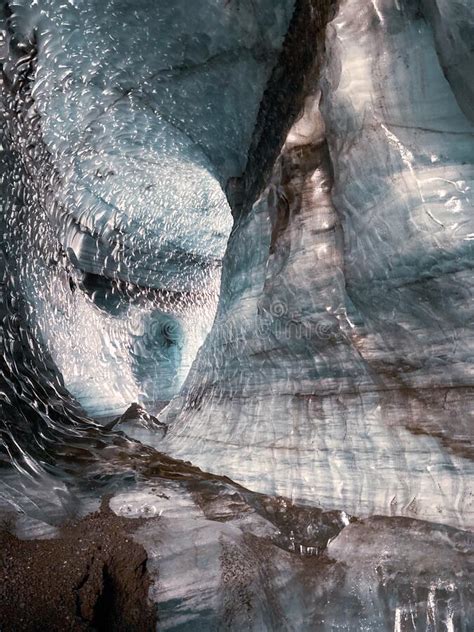 View Into A Glacier Cave With Ice And Ash Layers In Iceland Stock Image