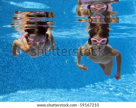 Two Girls Swimming Underwater Pool Stock Photo Shutterstock