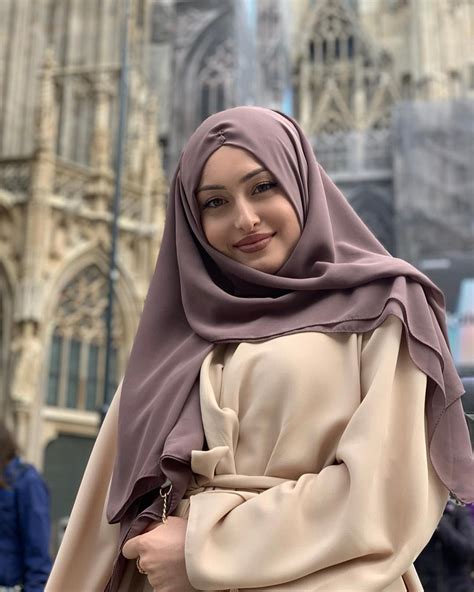 image may contain 1 person closeup dress kebaya hijab dress style maxi dress long maxi