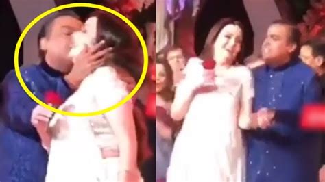 Mukesh Ambani Kisses Wife Nita Ambani And Openly At Akash Ambanis