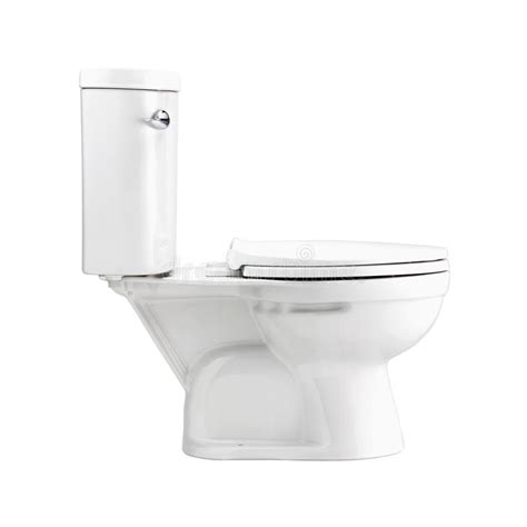 White Toilet Bowl In Bathroom Isolated With Clip Path Stock Photo