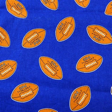 Football Pro Blue Fabric With Brown Footballs 44 Wide 49 Long