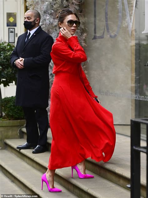 Victoria Beckham Wears Stunning Red Dress And Contrasting Hot Pink Heels Readsector