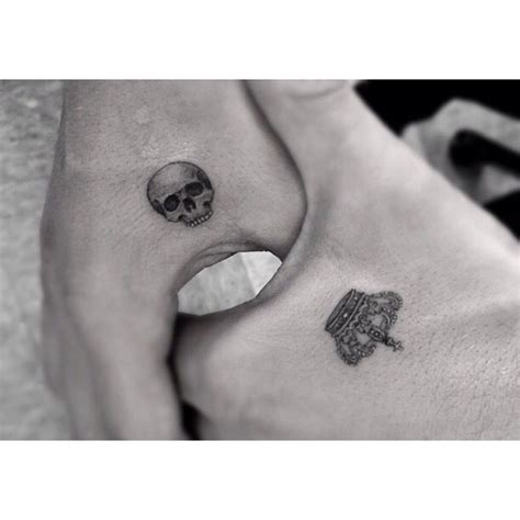 Small Skull Tattoos On Hand Hand Tattoos For Guys Small Hand Tattoos