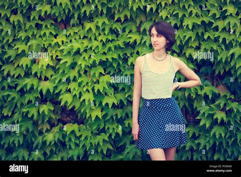 Cute Hipster Girl On Green Nature Background Stock Photo Alamy