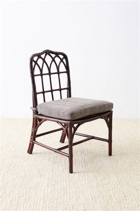 This chair with woven faux rattan is perfect if you want to give your locale a more exotic look. Set of Four McGuire Lacquered Bamboo Dining Chairs For Sale at 1stdibs