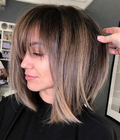 The final look results in natural bangs framing both sides of your face. 35 Long Bob Haircut Looks for Women - Short Haircuts