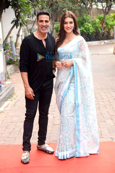 Photos Akshay Kumar Spotted In Grey Athleisure Wear Kriti Sanon Sports A White Saree As They