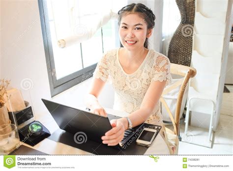 Freelance E Business Asian Women Using Laptop Computer In