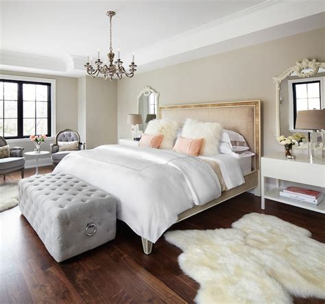 This bedroom is filled with cream color tones and abit of brown from the brown headboard and the two small contemporary elegant spanish inspired master bedroom with flower plants and calming color tones. Modern French Bedrooms - French - bedroom - The Design Company