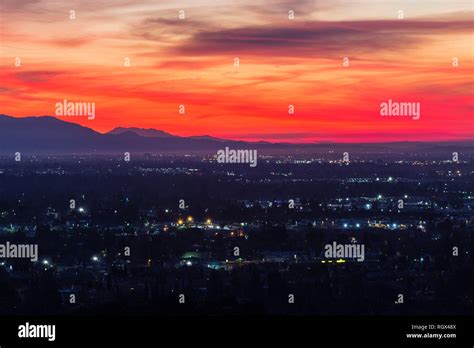 Colorful predawn view of San Fernando Valley neighborhoods and the San