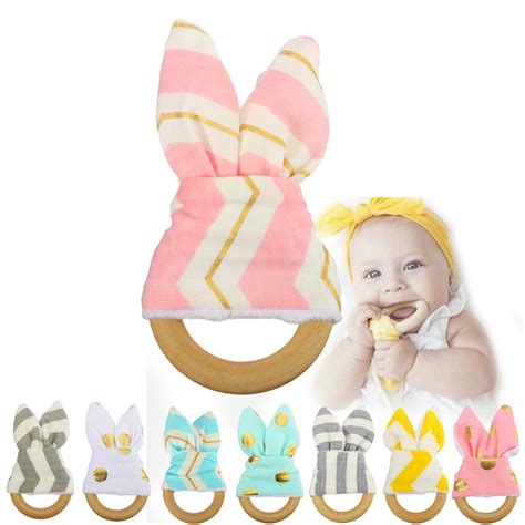 Hot Sale Baby Care Baby Teething Ring Teether Bell Natural