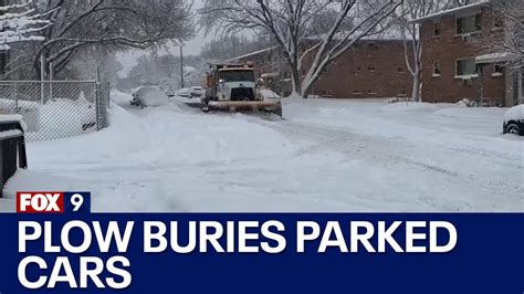 Snow Plow Buries Vehicles In Minneapolis After Heavy Snow Youtube