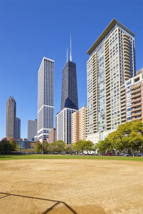Chicago City Downtown Buildings Seen From A Playing Field Stock Photo