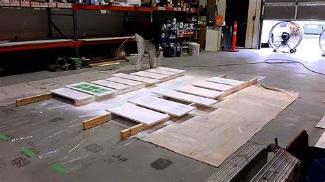 Spraying cabinet doors. - YouTube