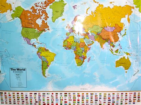 World Flag And Laminated World Map
