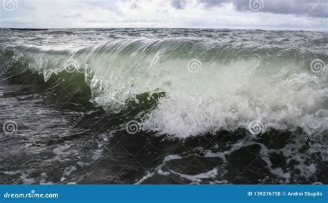 Storm Waves On The Seashore As A Background Stock Photo Image Of