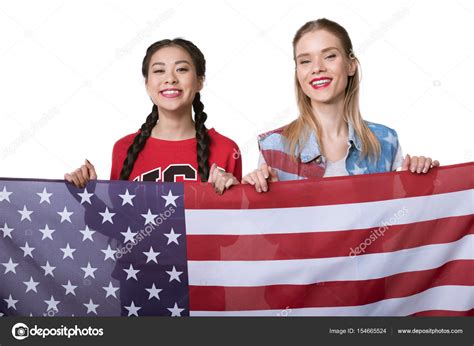 Multiethnic Women Holding Flag Of Usa — Stock Photo © Natashafedorova