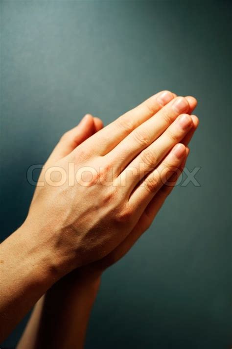 Hands Clasped In Prayer Stock Image Colourbox