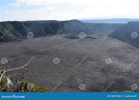 Dormant Volcano Crater Filled In With Rock With Ridge And Rain Forest