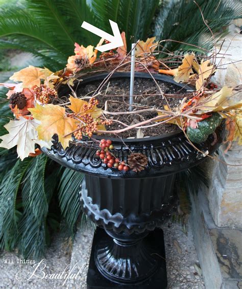 Beautiful decorative elements with the motif of easter eggs captivate so that they bring a pleasant, festive atmosphere to made out of old pallets, this pair of diy planters would add some brilliant character to your front porch topiaries. All Things Beautiful: DIY Fall Porch {Pumpkin Topiary}