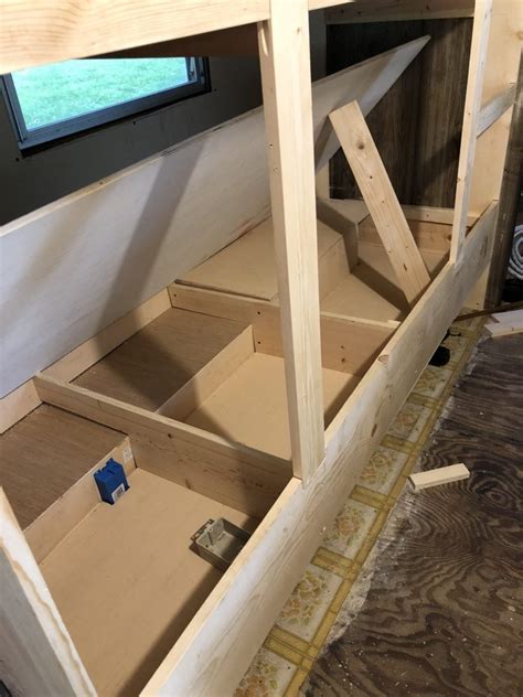 I'll show you how to build the bunk, and then i'll share more details on how we make it all work at the end. adding storage under a camper bunk bed - The Touring Camper