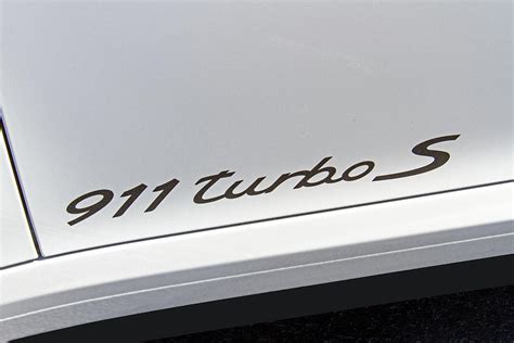 Porsche 911 Turbo S Logo Photograph By Nick Gray