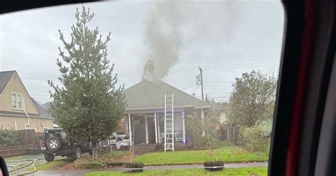 Firefighters Extinguish Springfield House Fire