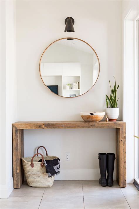 Rustic Meets Modern Front Entrance Design With Console Table And Round