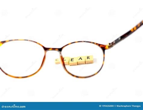 Glasses And A Block Of Letters That Read Clear Clear Vision On