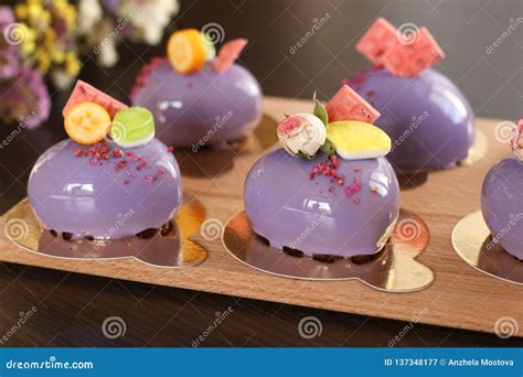 Homemade Bright Mousse Cakes Hearts With Purple Mirror Icing Stock