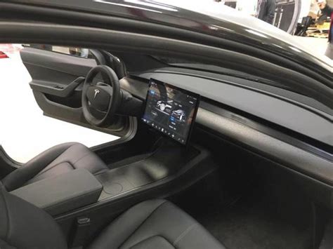 Leaked Photos Show Off The Tesla Model 3s Beautiful Interior