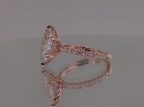 Josh Levkoff Collection Rings 355 Marquise Set Diamonds With Underneath Halo Set In Rose