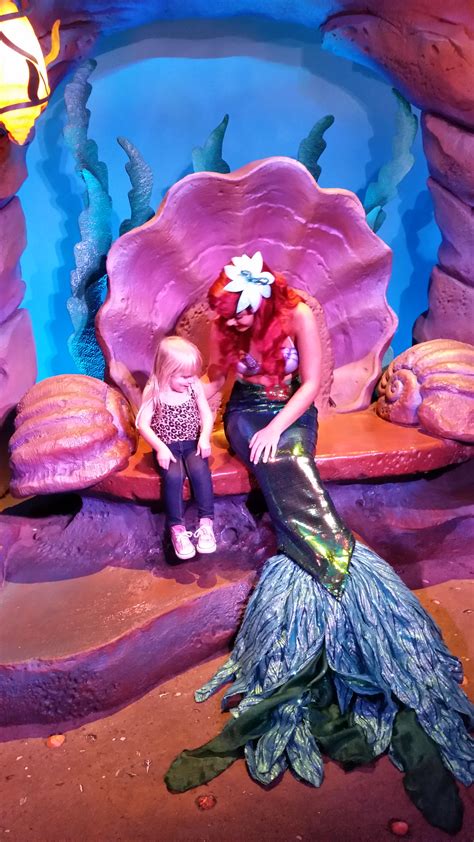 Ariel Awaits Guests In Her Grotto Sitting In Her Clam Shell Seat If You Are Looking Forward To