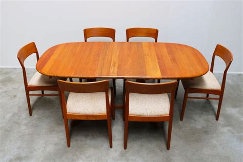 It is available in two color combinations: Danish Dining Room Set by Kai Kristiansen for Korup Stolefabrik Solid Teak, 1950 For Sale at 1stDibs