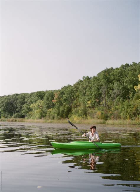 Woman Kayaking On Lake Stock Image Everypixel