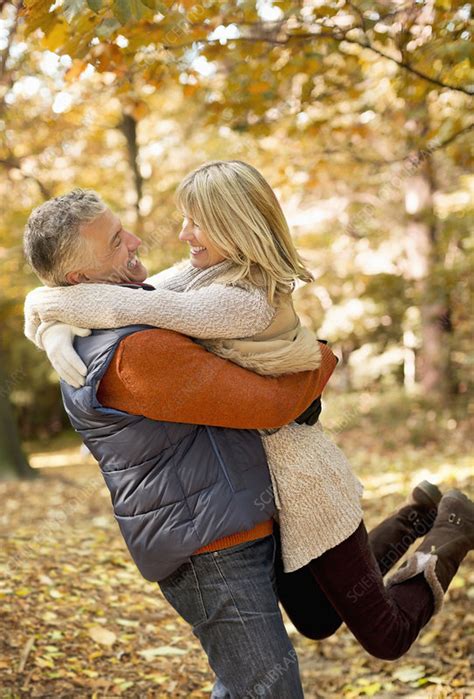 Older Couple Hugging In Park Stock Image F0137736 Science Photo Library