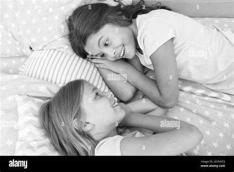 There Is No Friend Than A Sister Happy Little Sisters Talking During Nap Time Small Sisters