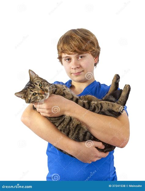 Teen Boy Holds His Tabby Cat In His Arms Royalty Free Stock Photos