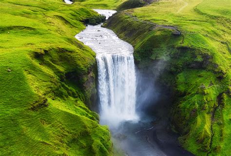 Aerial View On The Skogafoss Waterfall In Iceland Landscape From Air