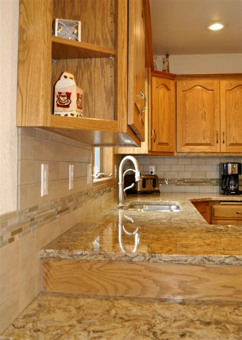 Maybe you would like to learn more about one of these? This backsplash helps enhance the countertop without being ...