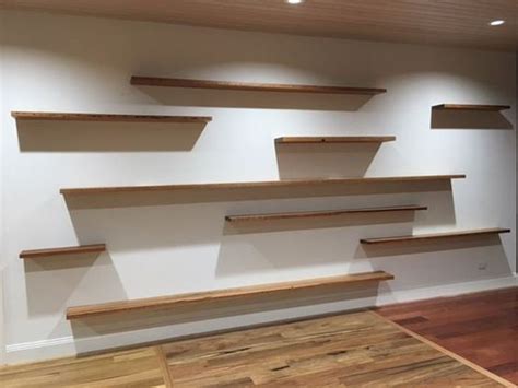Thin Floating Shelves Made From Plain Pine Wooden Planks Image 0