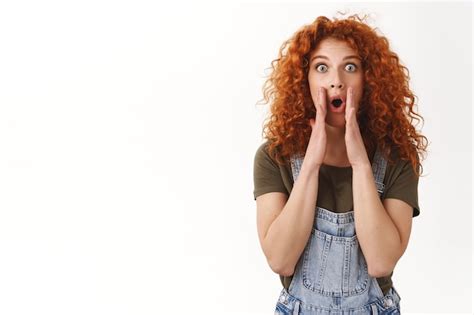 Premium Photo Astonished Excited Curly Haired Ginger Woman Popping