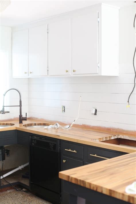 People often just want a change. Refinishing Kitchen Cabinets - A Beautiful Mess